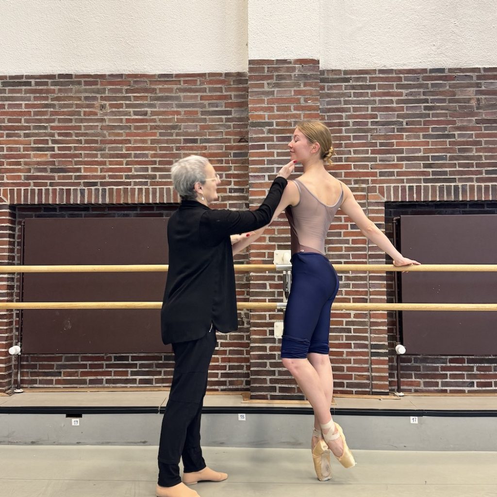 Lynne Charles working with a dancer. Photo courtesy of Charles.