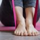 Young woman doing sports exercises with elastic band. Image by pvproductions on Freepik.