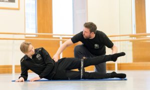 Wayne Kitchener with a student. Photo by Pierre Tappon.