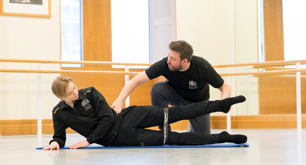 Wayne Kitchener with a student. Photo by Pierre Tappon.