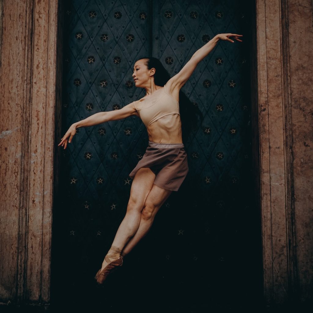 Hope K. Ruth in spray painted pointe shoes. Photo by Braulio Lara.