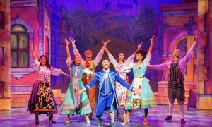 Charlie Stemp as Buttons and the Cinderella Ensemble in 'Cinderella.' Photo by Ian Olsson.